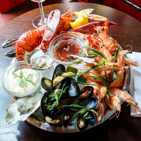 Plateau De Fruits De Mer(Combo Of Lobsters, Grouper Fish, Octopus. Prawns, Calamari, Fried Rice & French Fries, Yaya Sauce & Green Pepper Sauce)